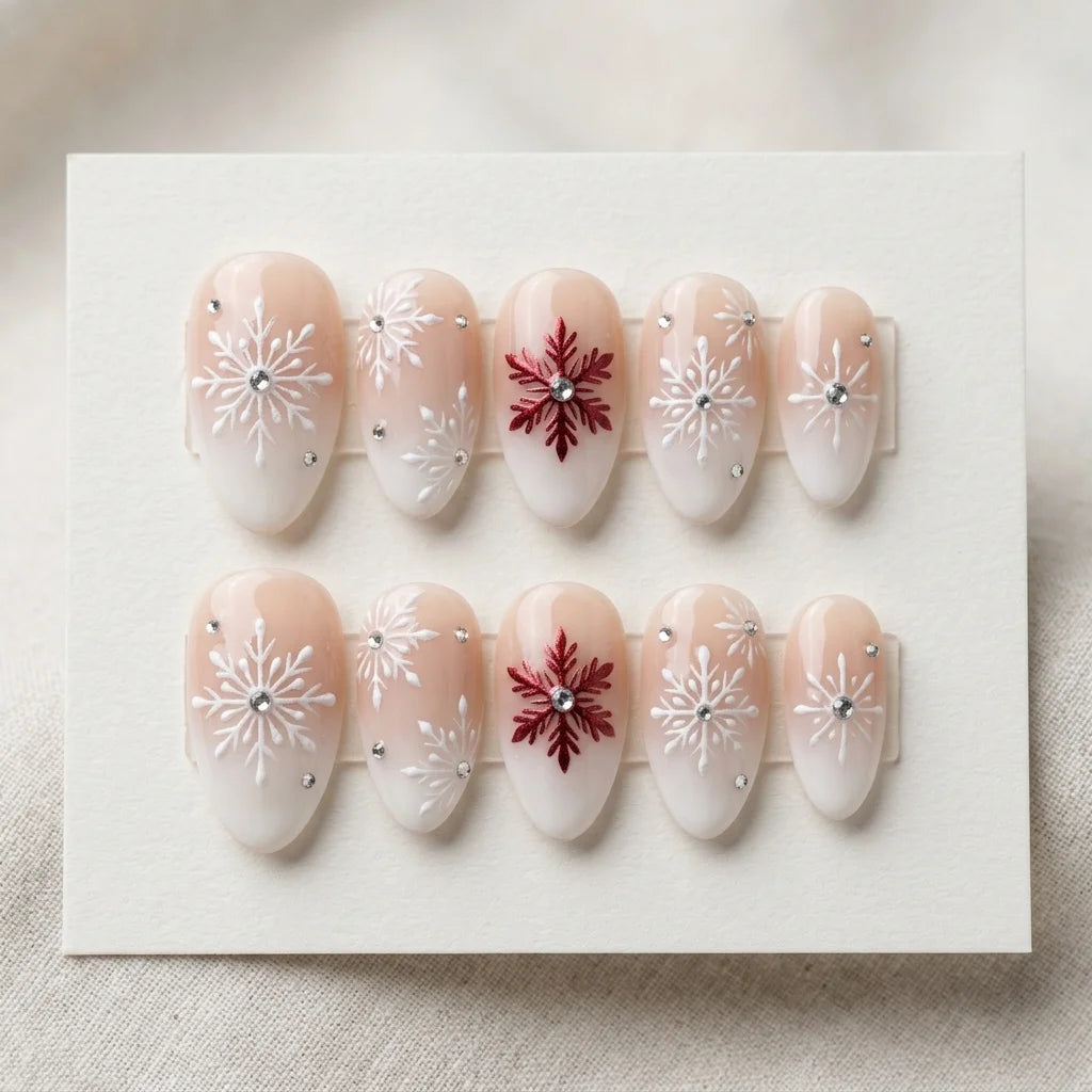 milky white blush nude 3d ombre almond press on nails winter snowflake rhinestone flat lay 04