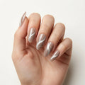 mocha tan cat eye almond long press on nails silver swirl flat lay 02