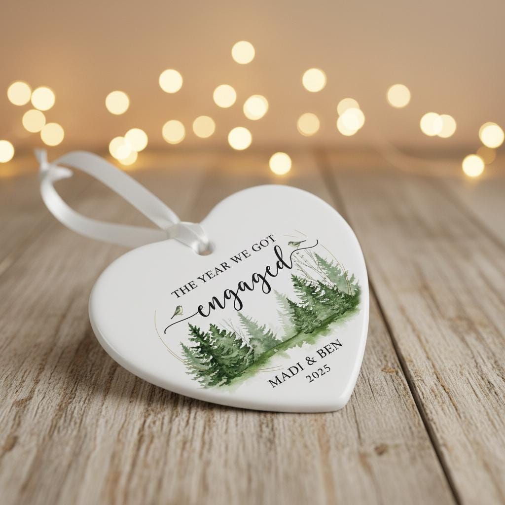 Heart-shaped ornament with engraved text on a wooden surface with blurred lights in the background