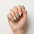moss green french tip almond press on nails gold dot flat lay 02