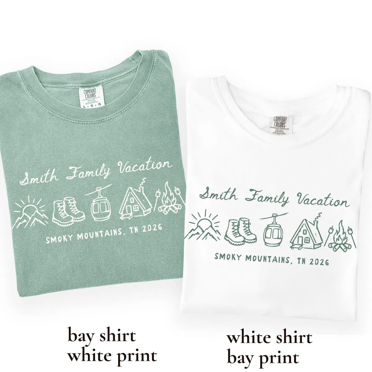 Folded Light green and White Comfort Colors tees side by side with Smith Family Vacation, mountain, boots and cabin