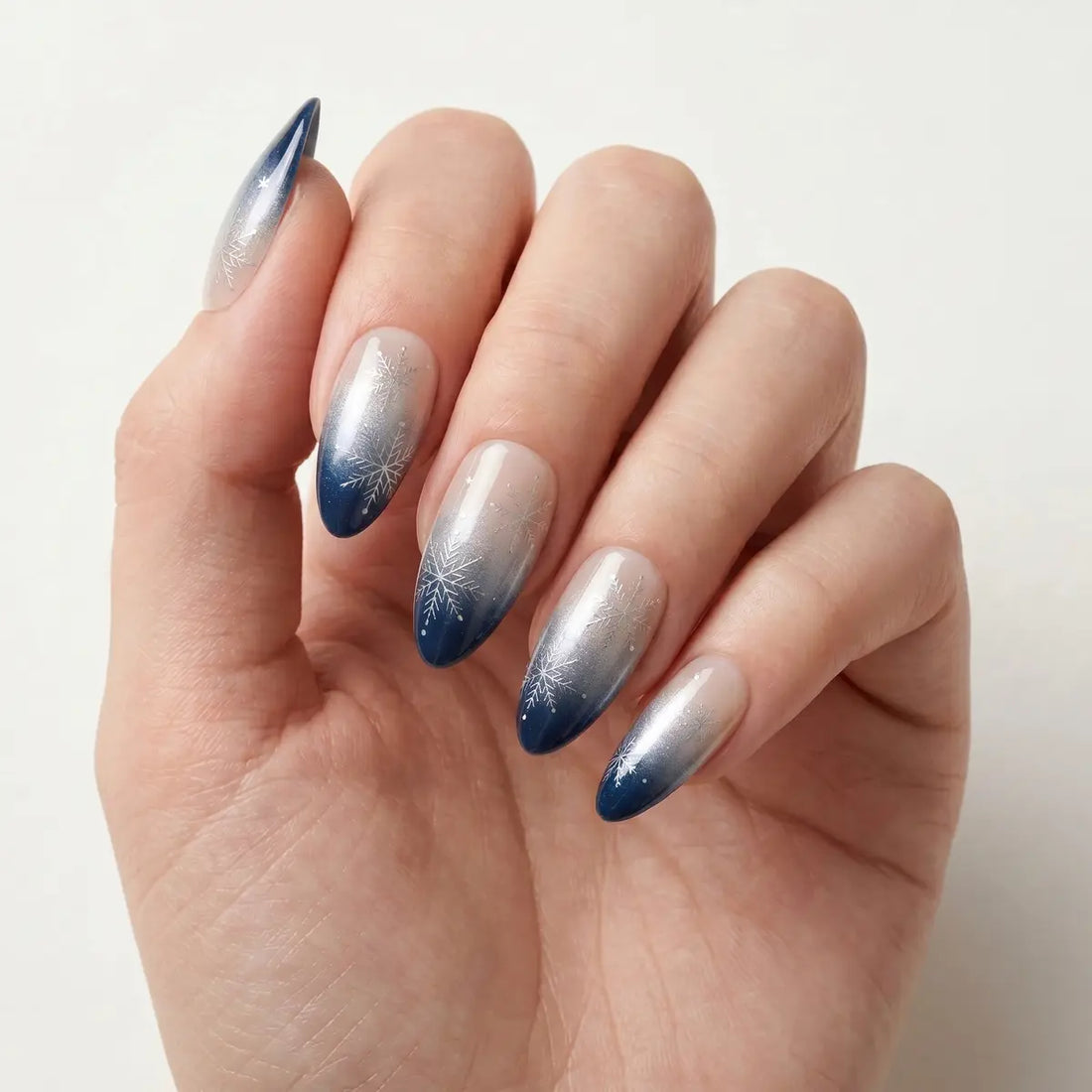 navy blue white ombre almond press on nails silver snowflake lifestyle 02