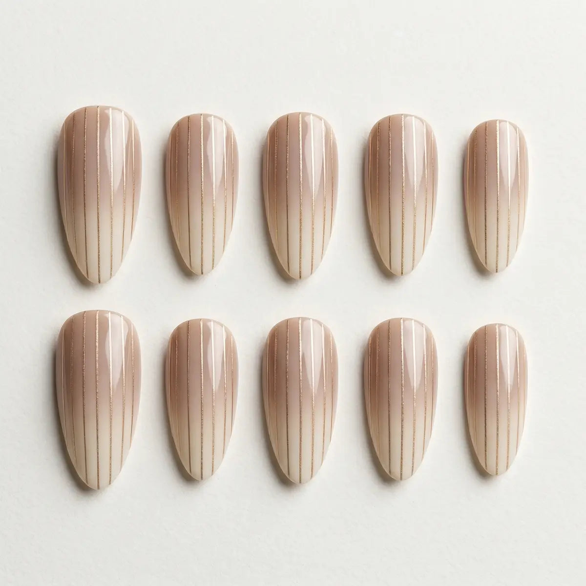 nude beige almond press on nails gold stripe mockup 01