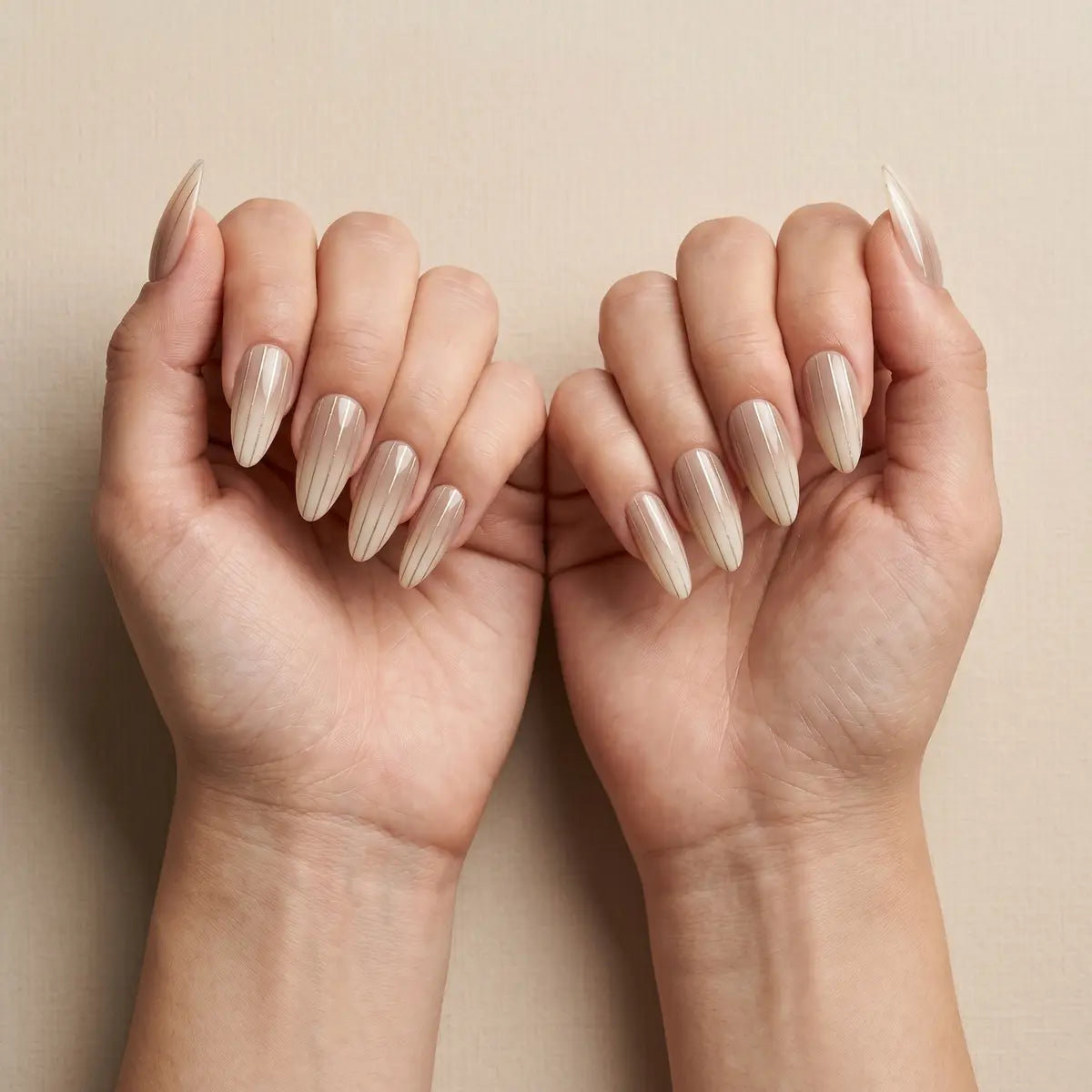 nude beige hand painted almond press on nails vertical pinstripe flat lay 04