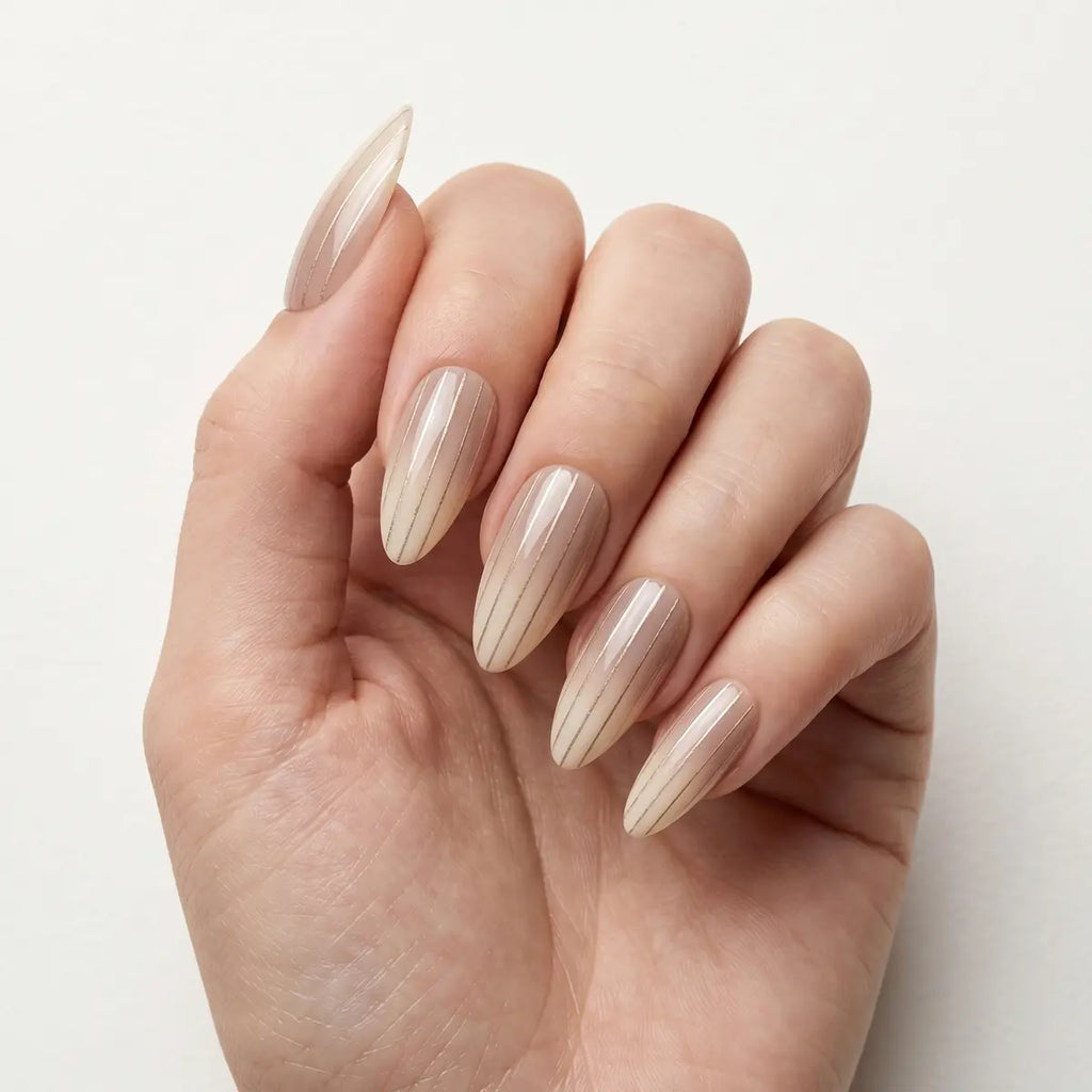 nude beige hand painted almond press on nails vertical pinstripe lifestyle 02
