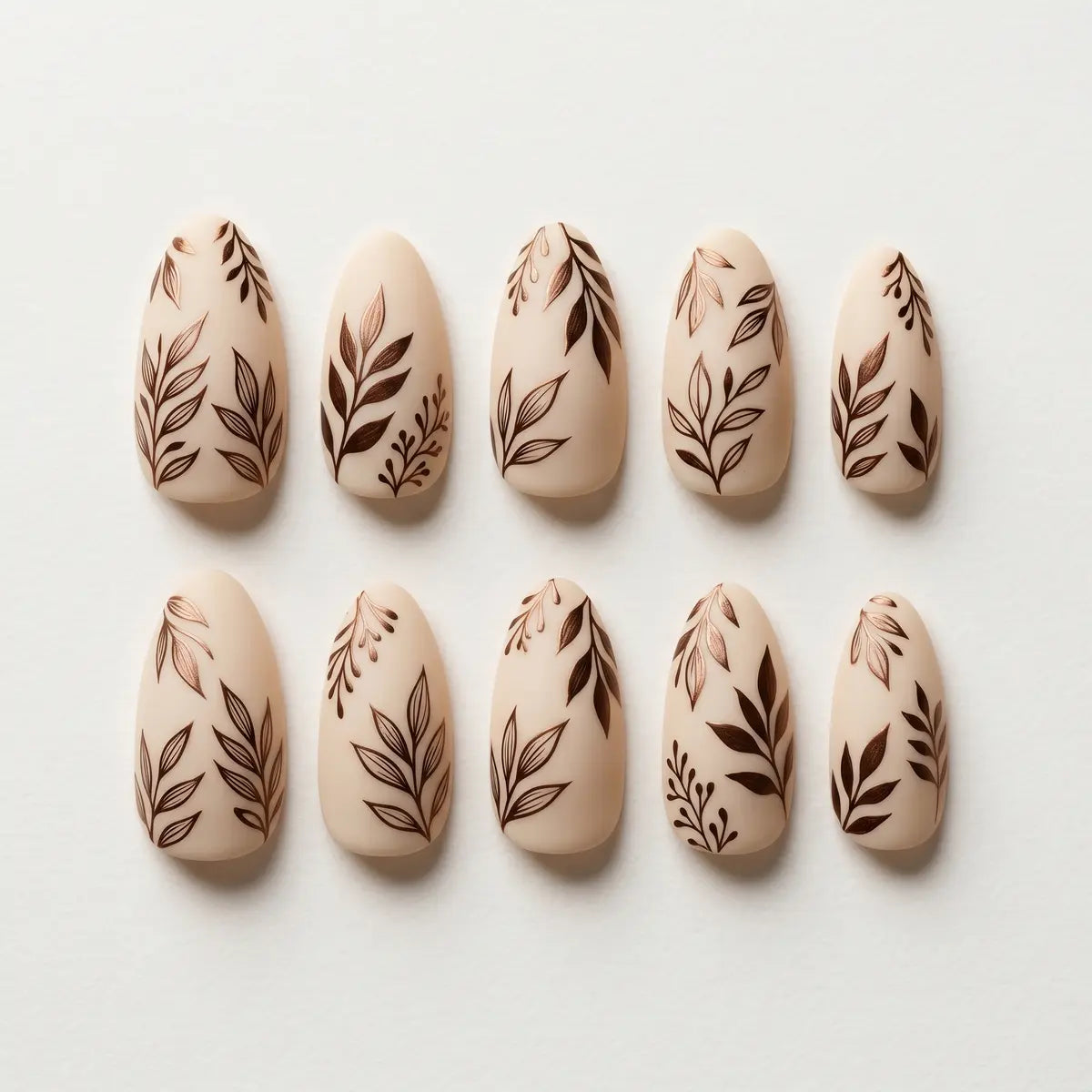 nude brown hand painted almond press on nails metallic leaf lifestyle 02