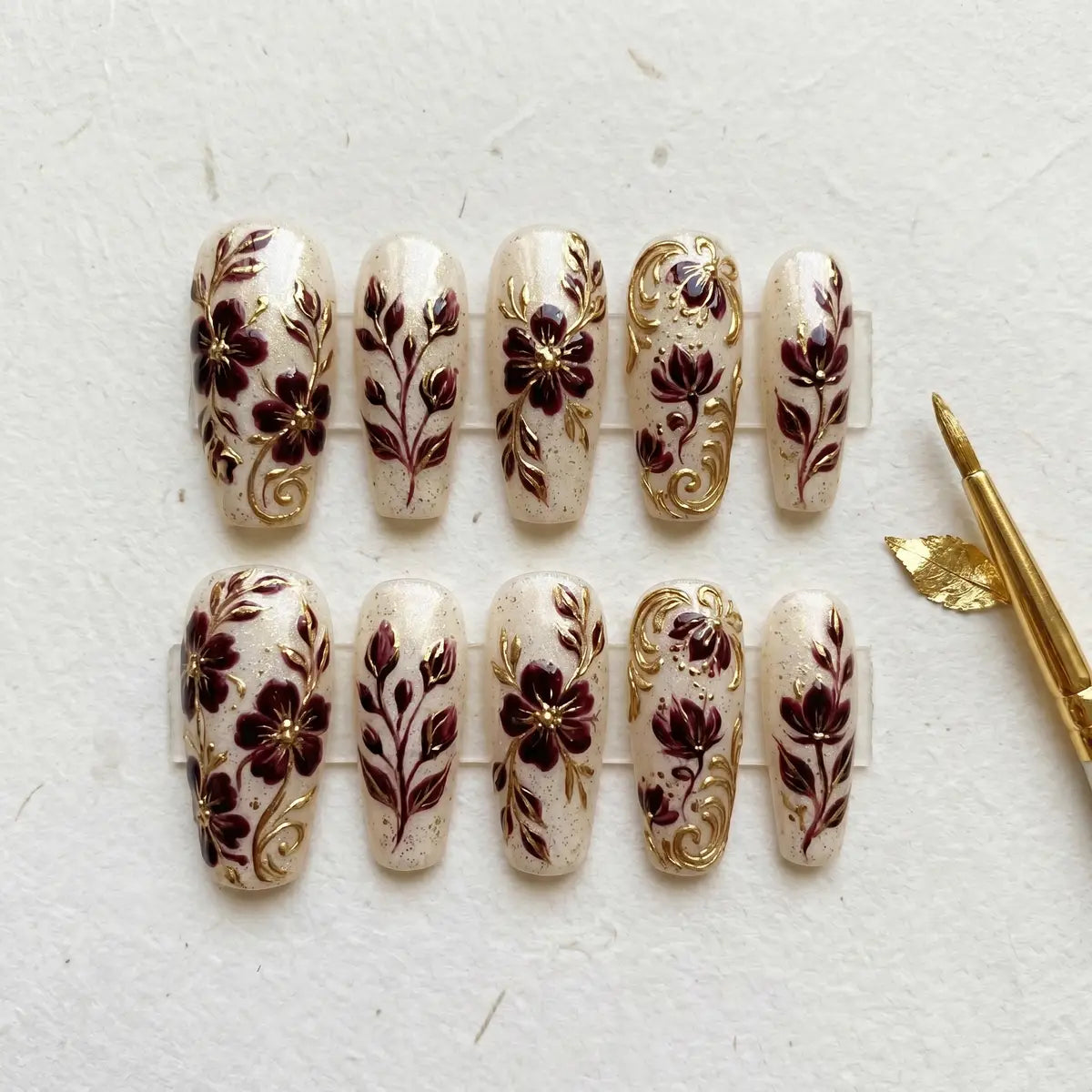 nude burgundy gold 3d coffin long press on nails floral leaf chrome mockup 01