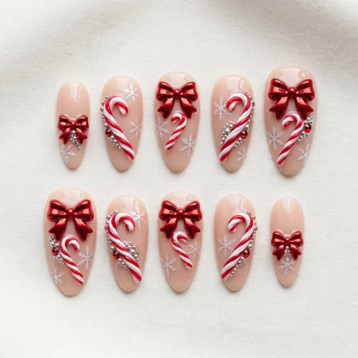 nude christmas 3d almond press on nails candy cane red bow mockup 01
