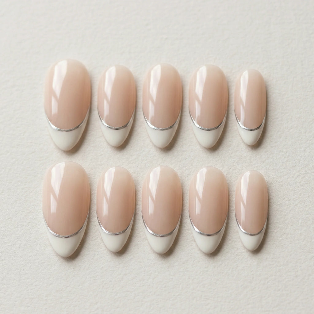 nude french tip hand painted almond medium press on nails silver lining flat lay 01