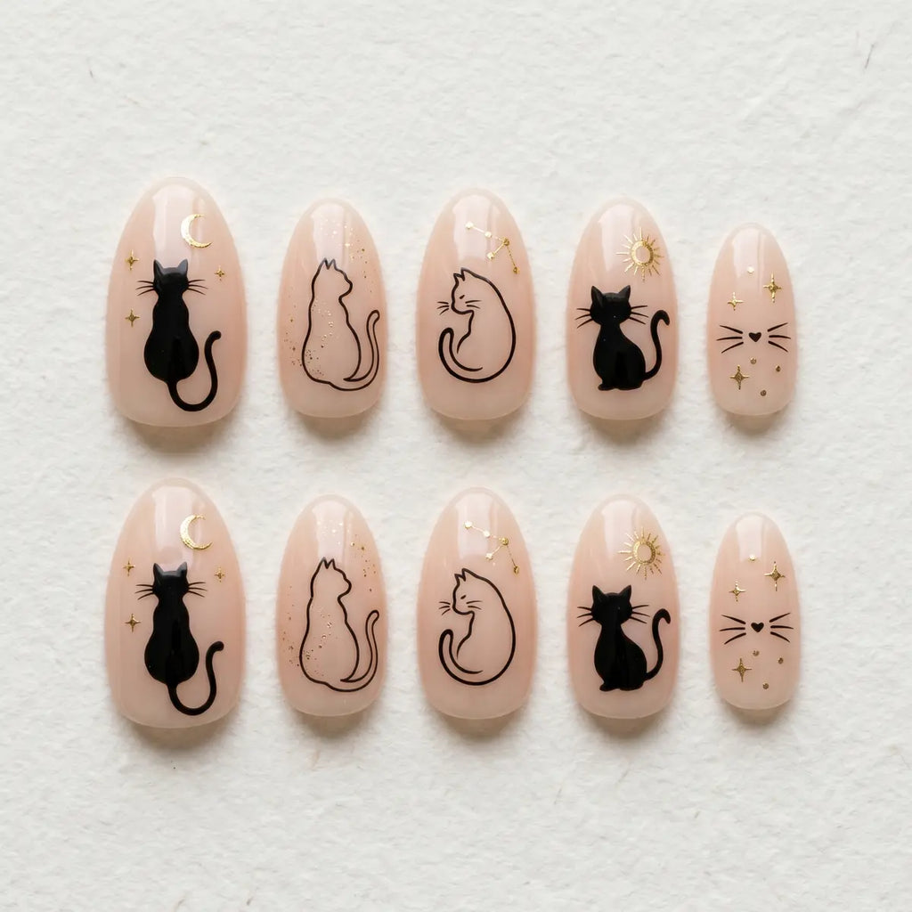 nude hand painted almond press on nails black cat moon star flat lay 01