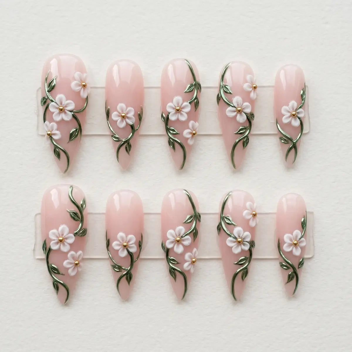 nude pink 3d stiletto long press on nails white flower green leaf mockup 01