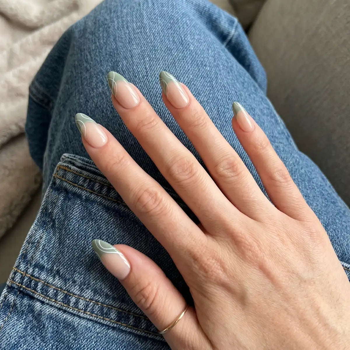 nude sage green french tip almond long press on nails white swirl lifestyle 01