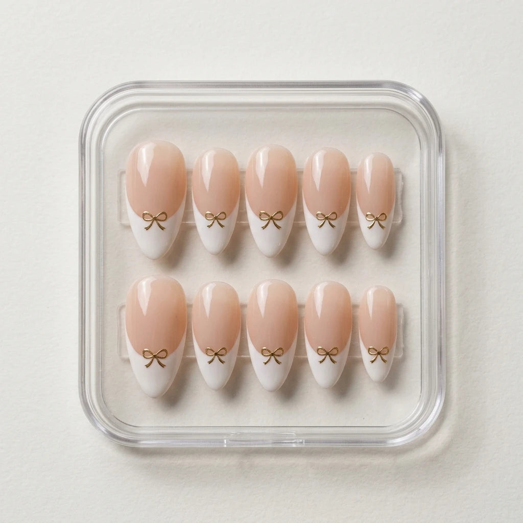 nude white french tip almond press on nails gold ribbon bow detail 01