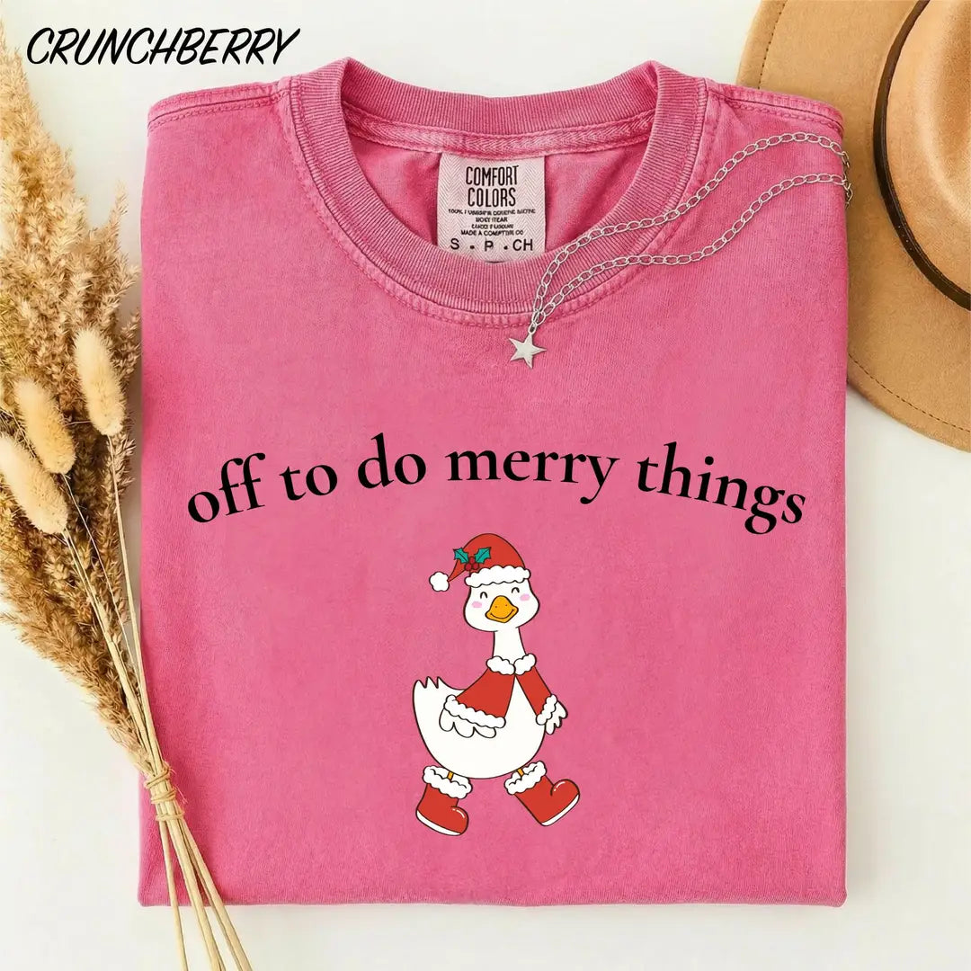 Comfort Colors T-shirt with Off To Do Merry Things holiday design; model photo.