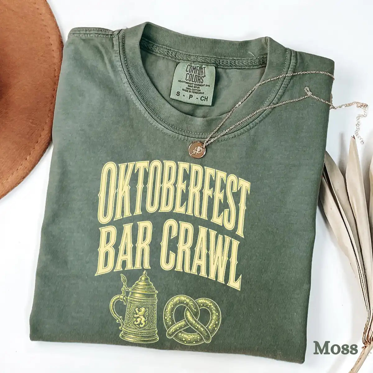 Light Comfort Colors T-shirt mockup showing Oktoberfest Bar Crawl Halloween design