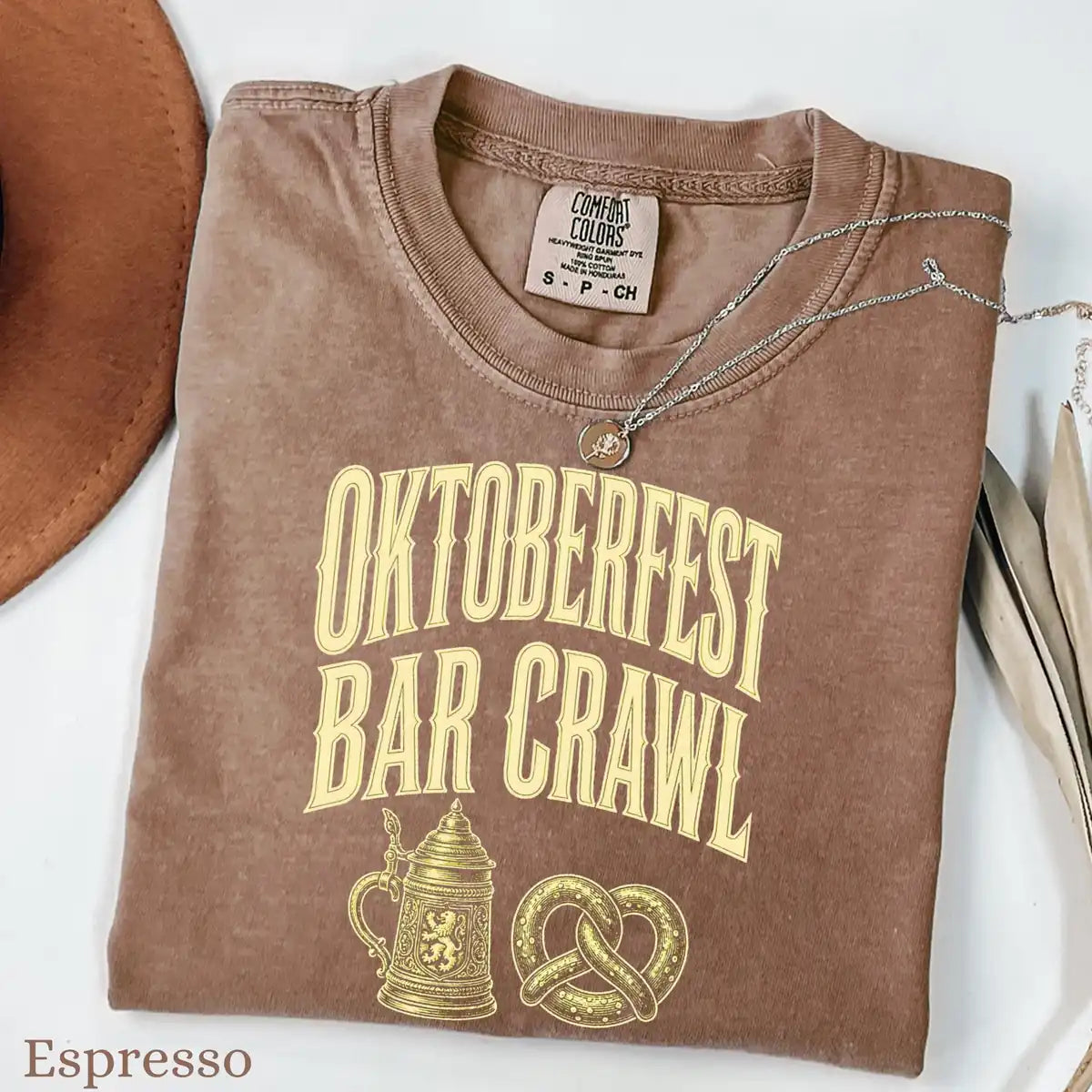 Violet Comfort Colors T-shirt mockup showing Oktoberfest Bar Crawl Halloween design