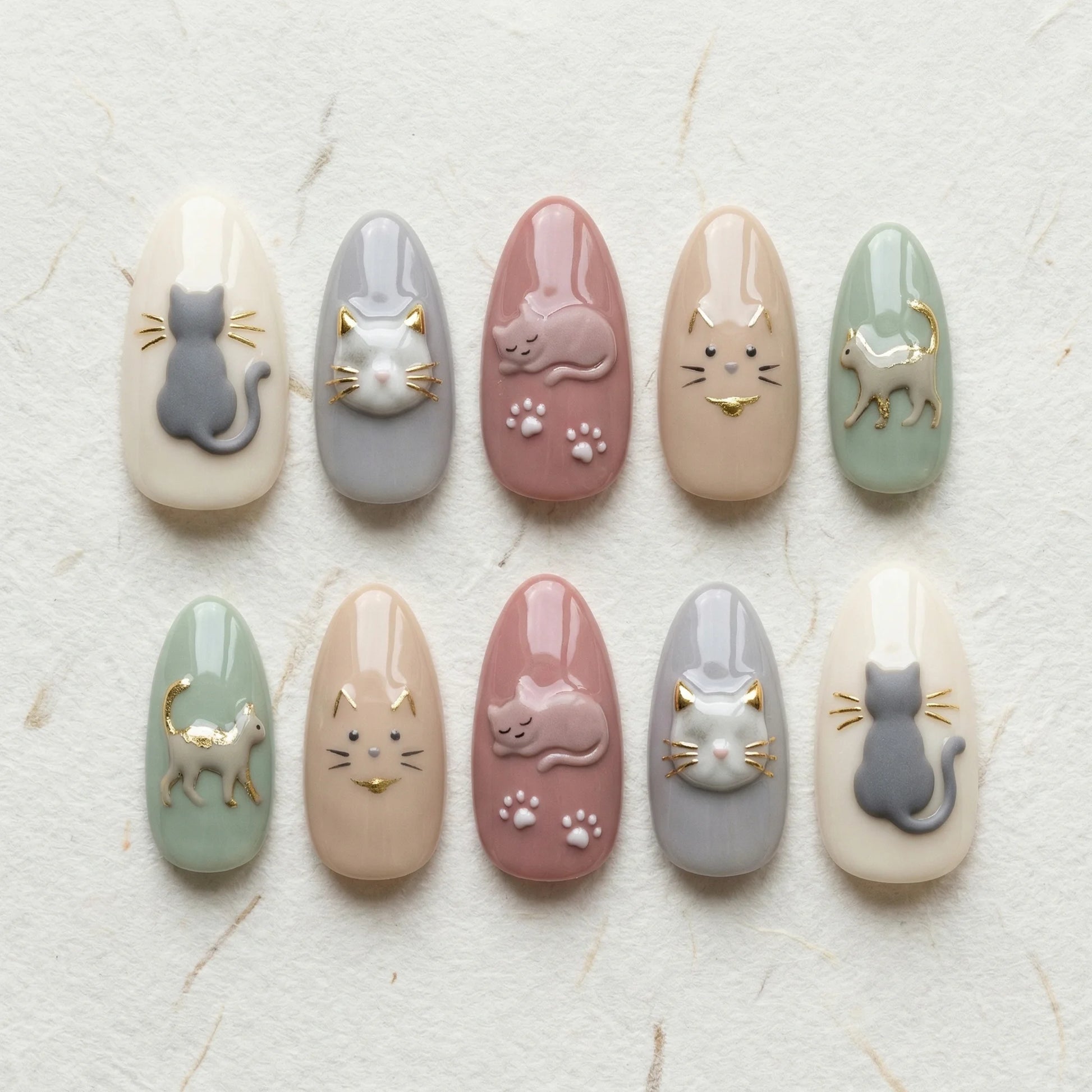 pastel 3d almond medium press on nails cat charms flat lay 01