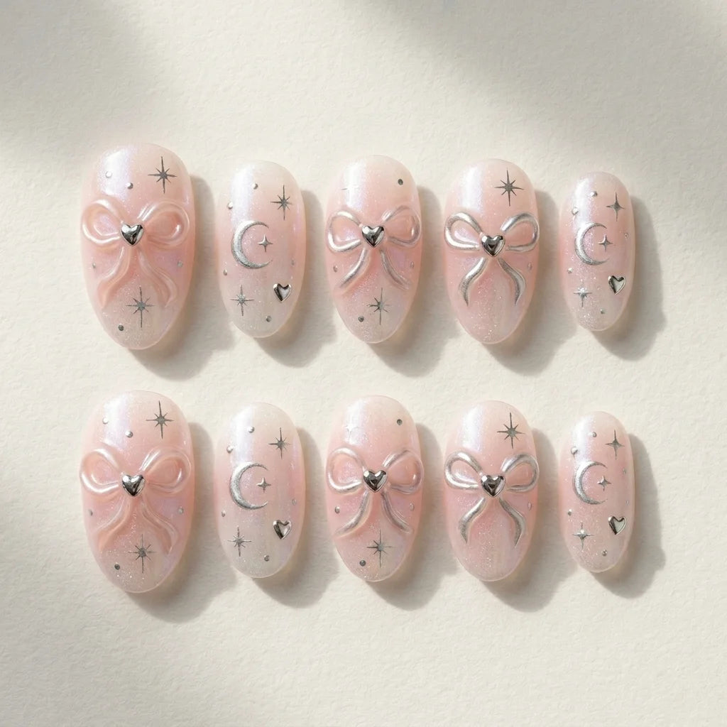 pearl white 3d chrome oval press on nails ribbon bow moon star heart flat lay 03