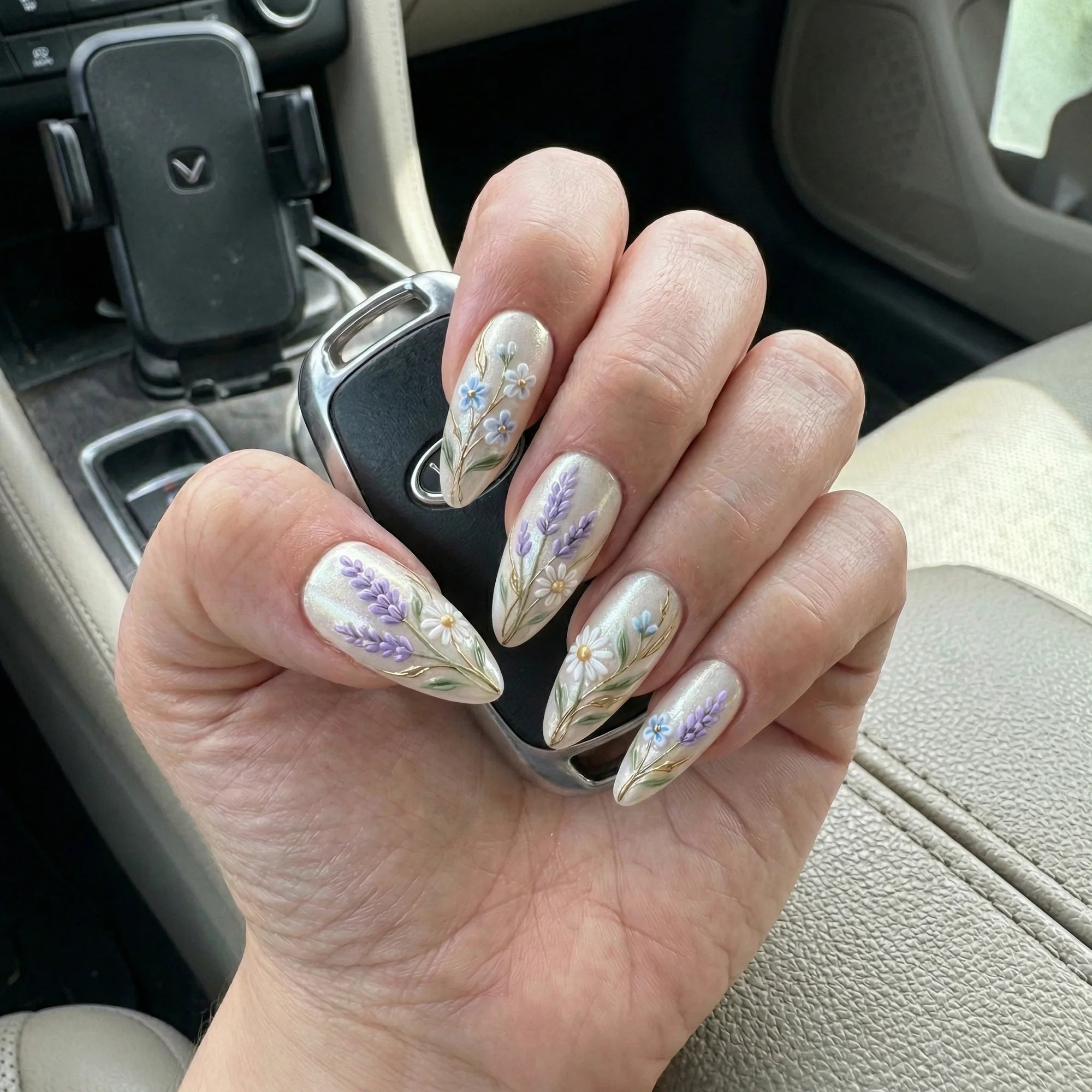 pearl white hand painted stiletto medium press on nails lavender daisy field lifestyle 02