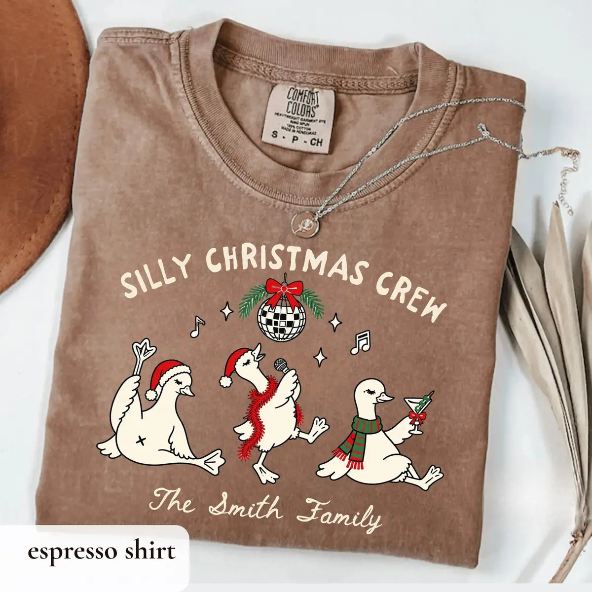 Comfort Colors T-shirt with Personalized Family Christmas Shirts holiday design; model photo.