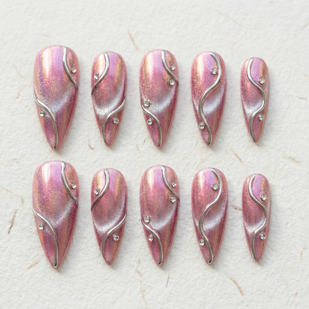 pink chrome stiletto medium press on nails silver wavy line flat lay 01