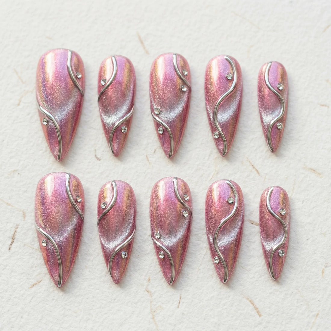 pink chrome stiletto medium press on nails silver wavy line lifestyle 02