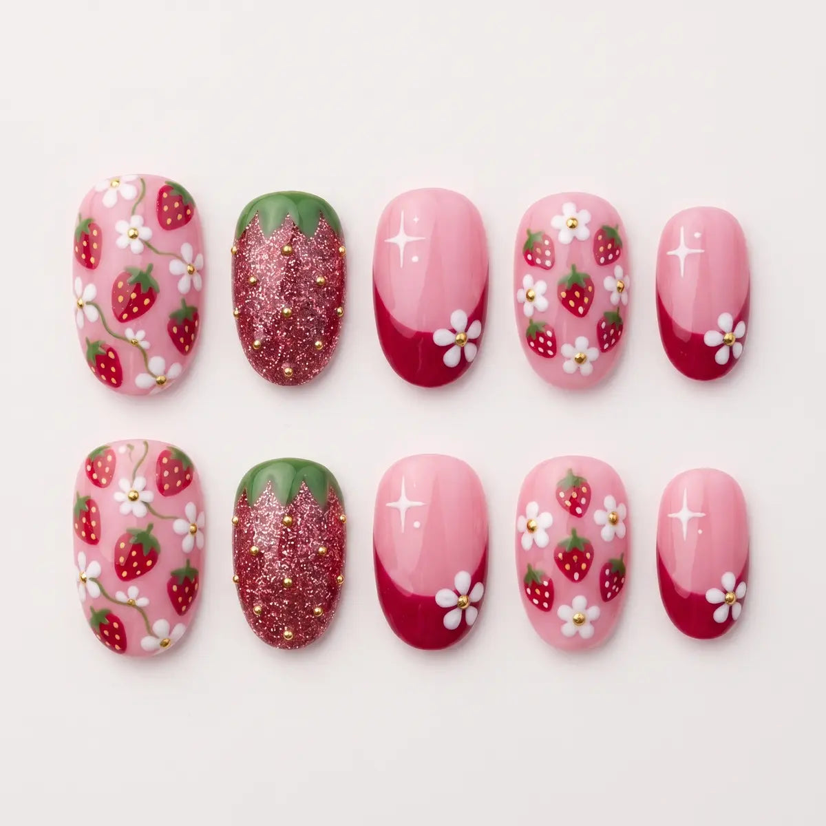 pink french tip oval press on nails strawberry flower star flat lay 01