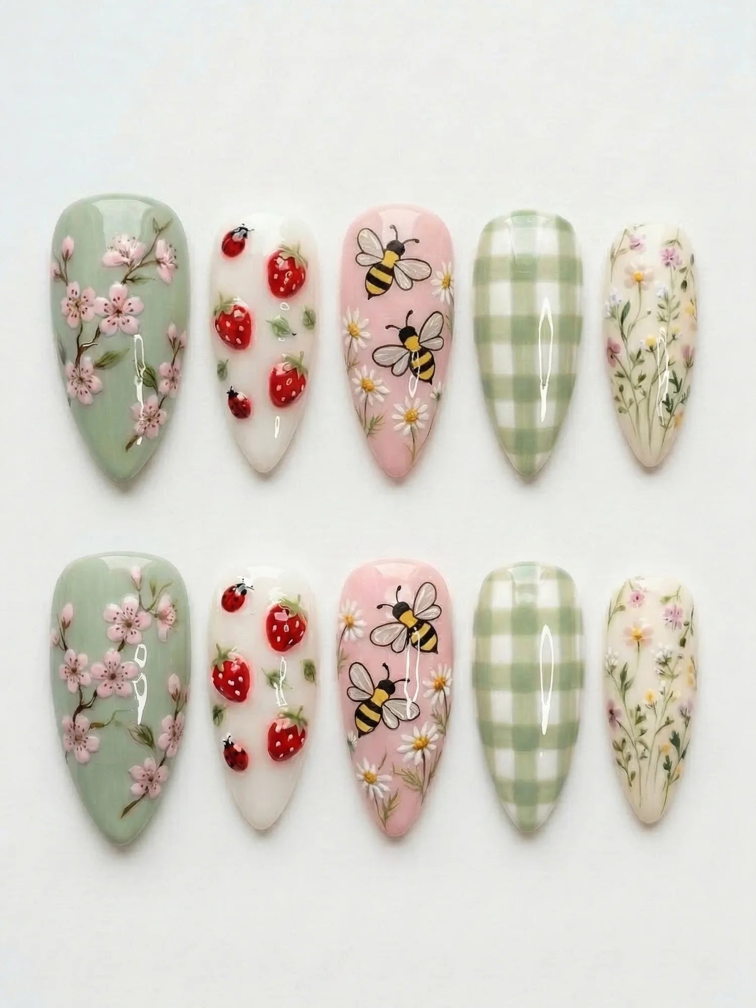 pink green red handpainted cottage garden bee strawberry cherry blossom gingham almond medium press on nails flat lay 01