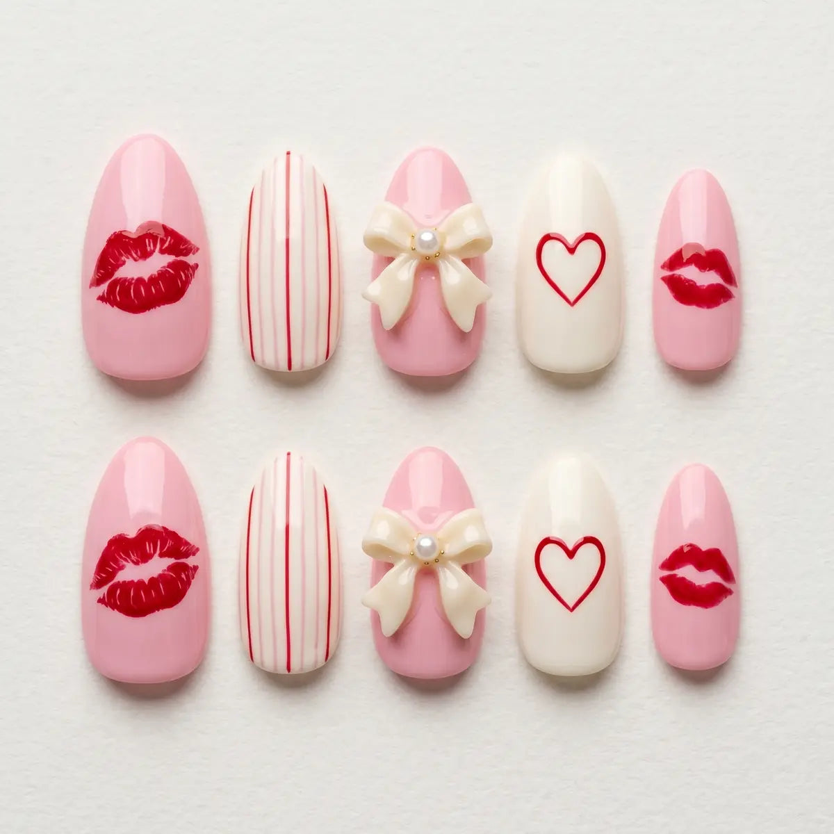 pink hand painted almond press on nails lips 3d heart jelly bow flat lay 01