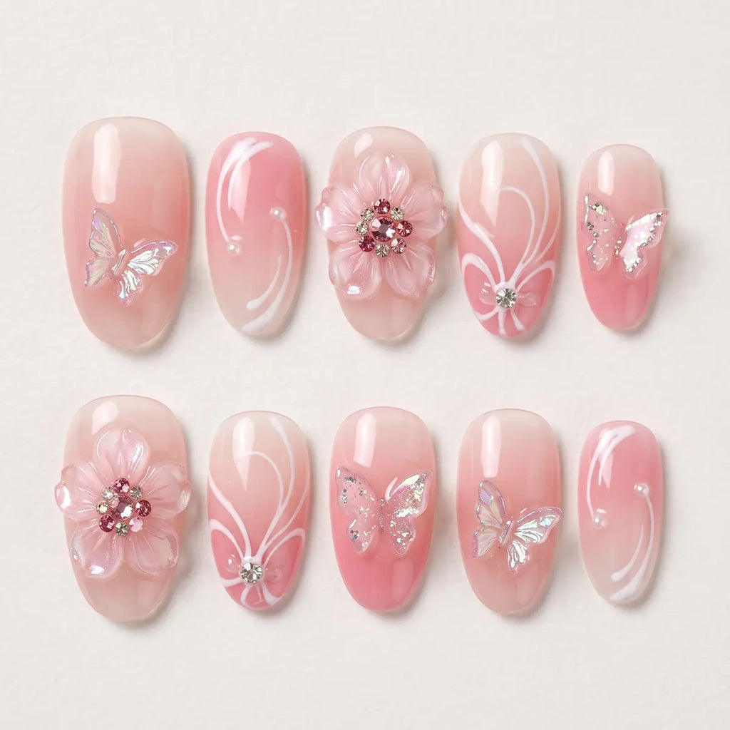 pink ombre almond press on nails 3d butterfly flower pearl flat lay 01