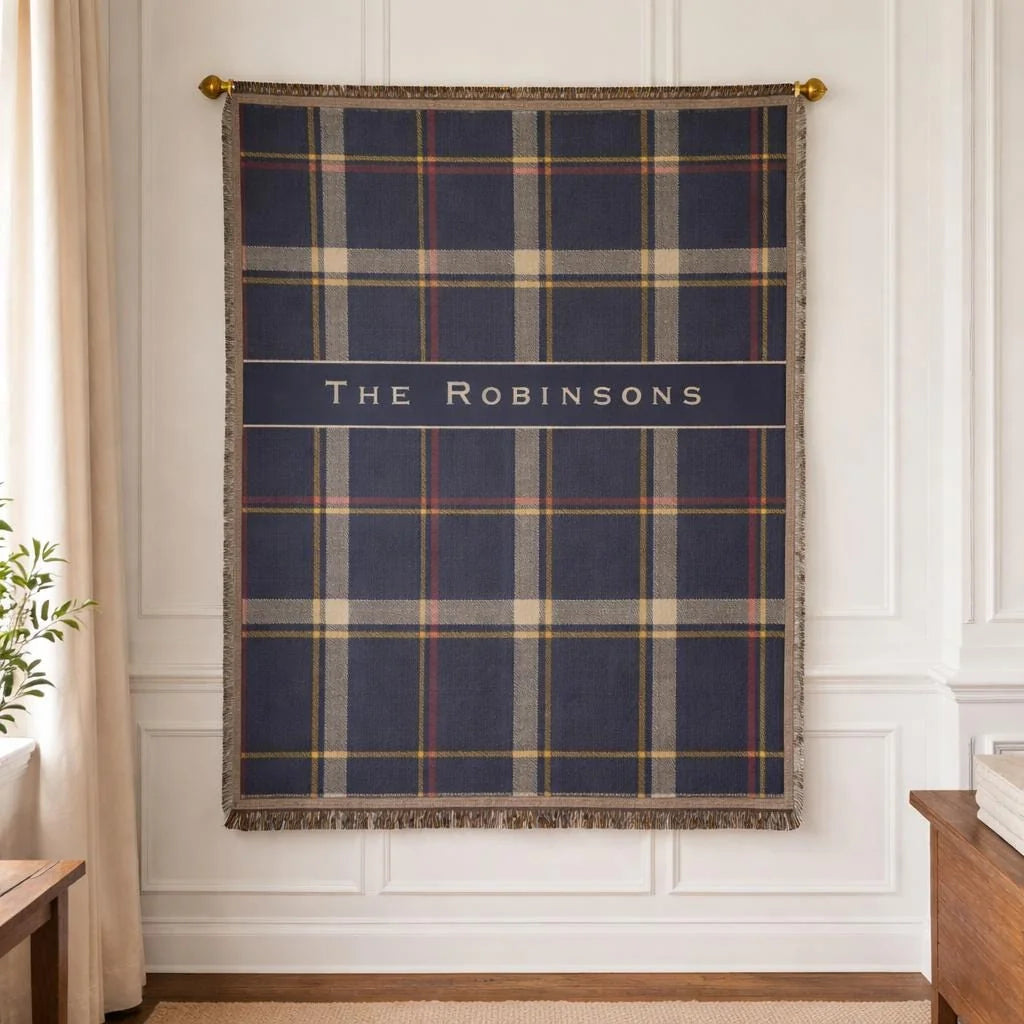 Close-up of the personalized plaid banner woven blanket with texture and fringe detail