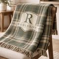 Close-up of the personalized plaid woven blanket with texture and fringe detail