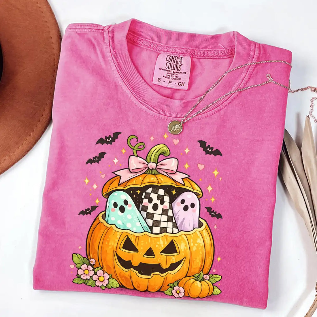 Violet Comfort Colors T-shirt mockup showing Preppy Pumpkin Ghost Halloween design