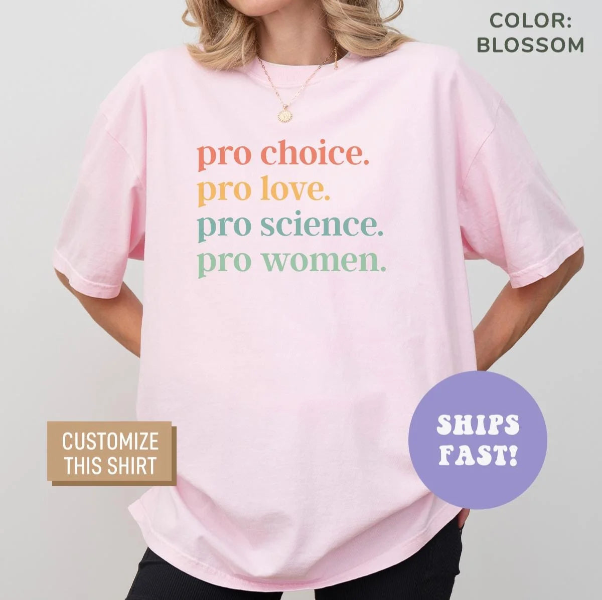 Woman in a Blossom pink Comfort Colors tee with four stacked lines in coral, gold and sage reading pro choice to pro women