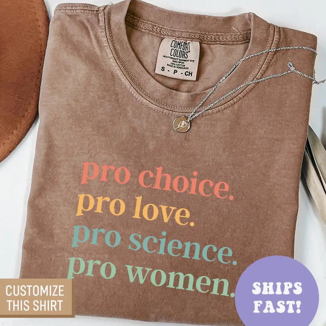 Folded Espresso brown Comfort Colors tee with stacked multicolor pro choice, pro love, pro science, pro women lettering