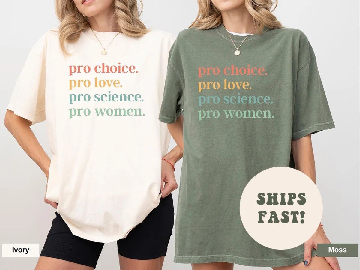 Two women side by side in Ivory and Moss Comfort Colors tees, each with the pro choice, pro women stacked text