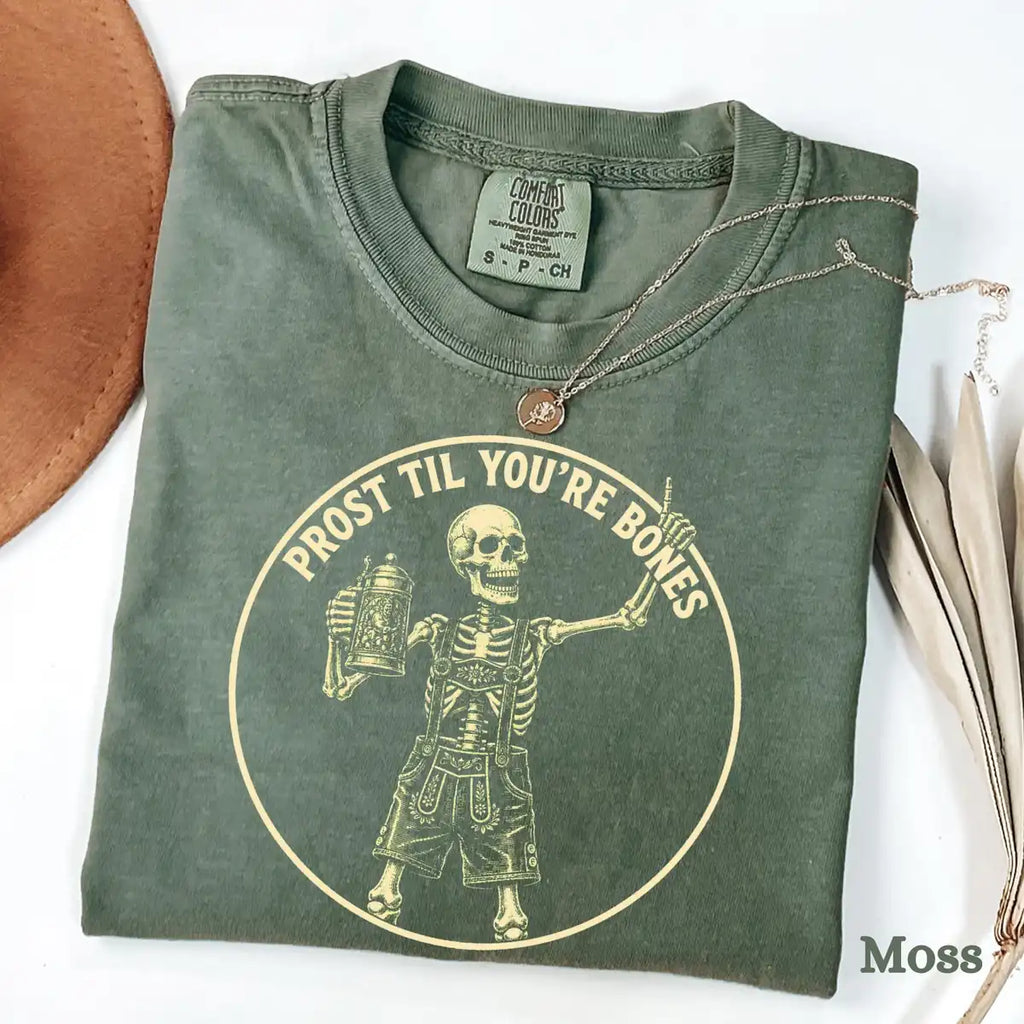 Woman wearing Light Prost Til Youre Bones - Oktoberfest Skeleton Halloween Comfort Colors T-Shirt