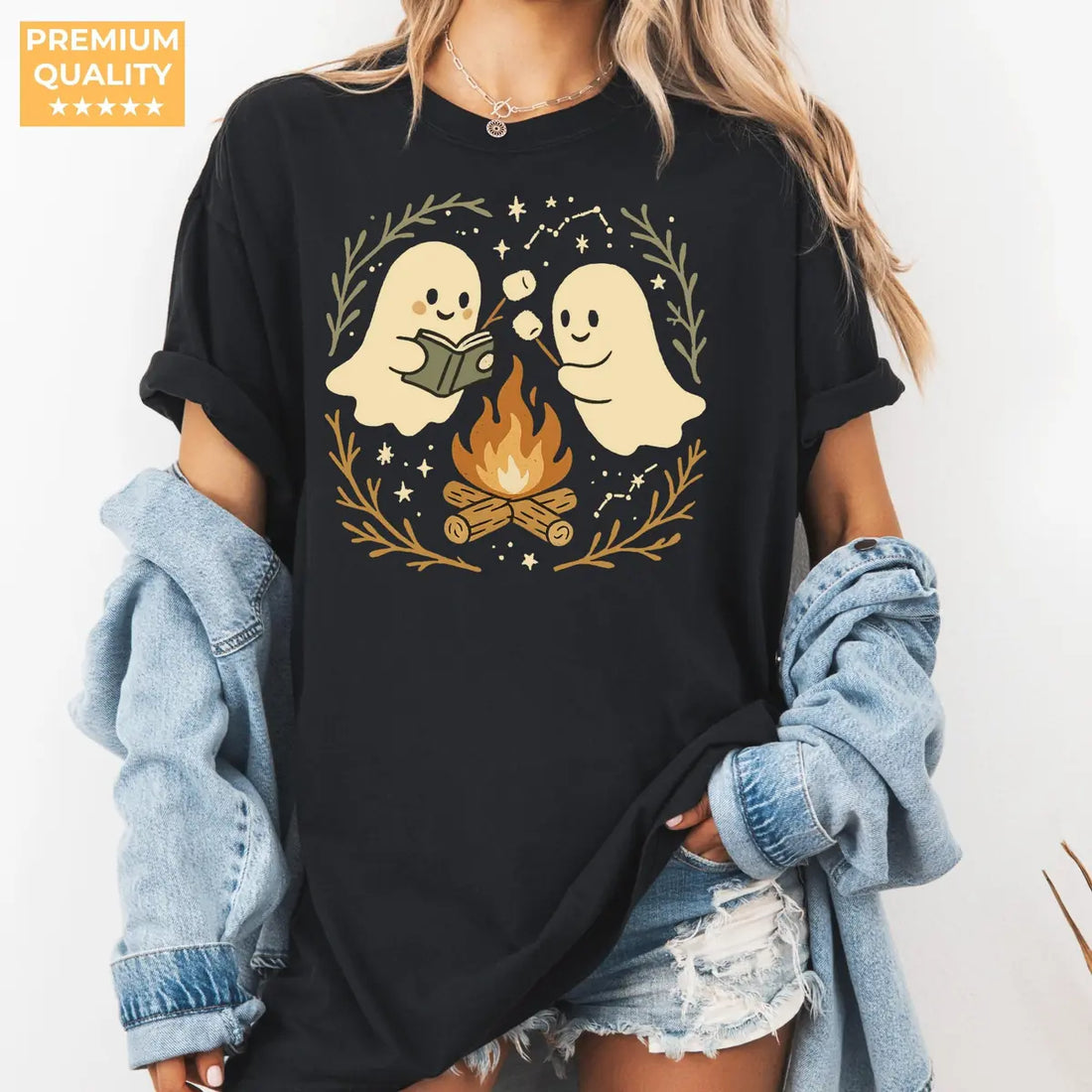 Black Comfort Colors T-shirt mockup showing Retro Ghost Reading Books Halloween design