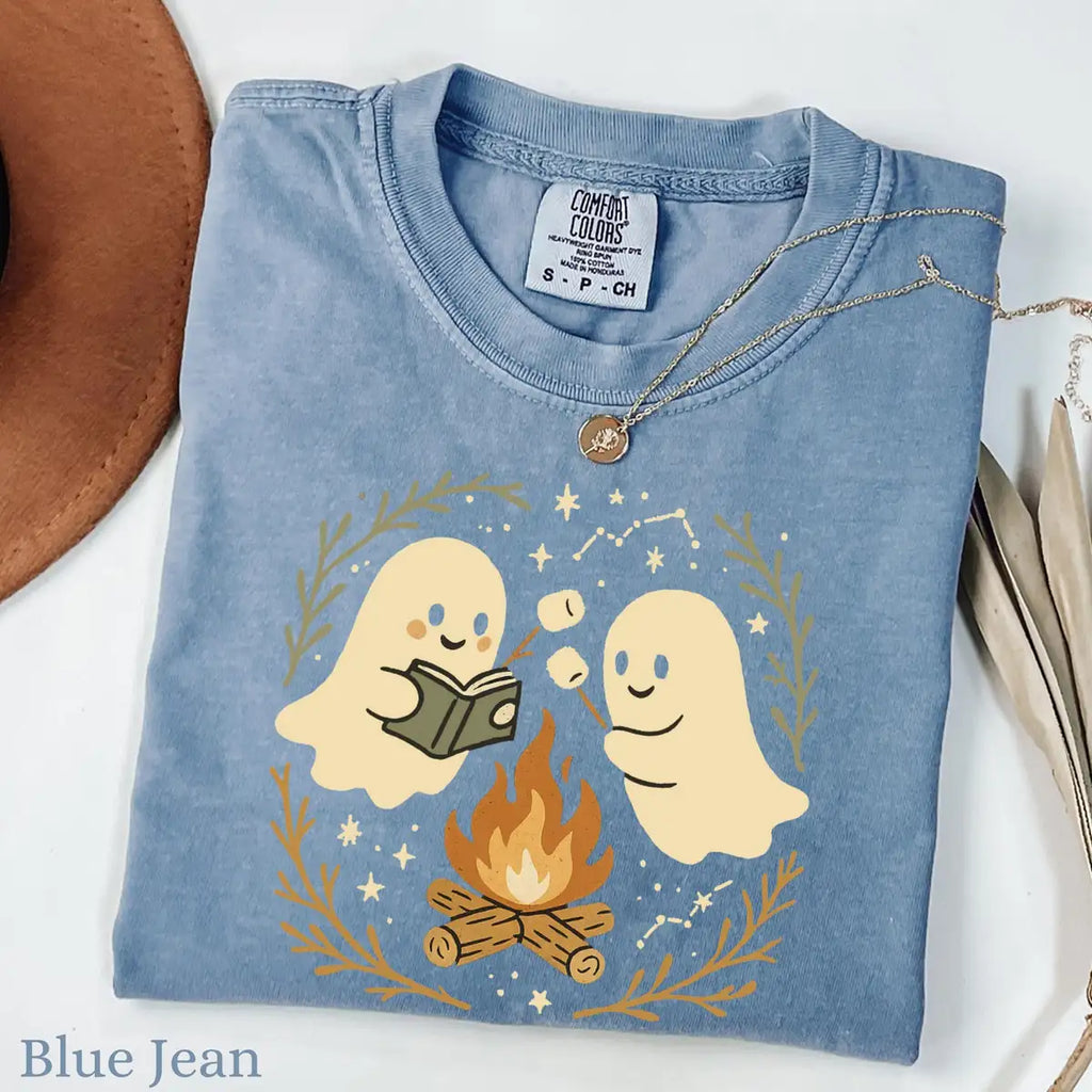 Comfort Colors T-shirt mockup showing Retro Ghost Reading Books Halloween design