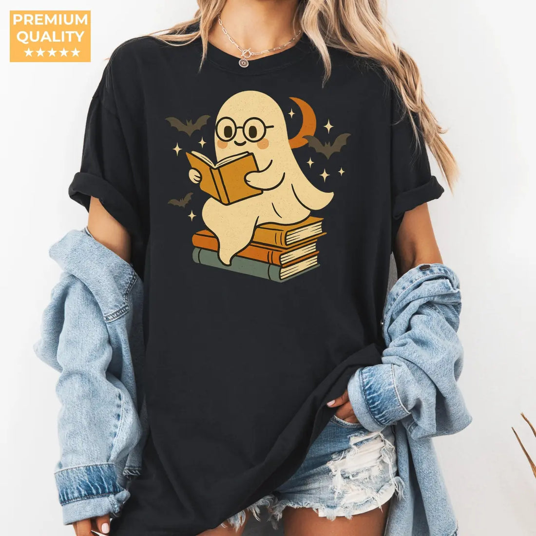 Black Comfort Colors T-shirt mockup showing Retro Ghost Reading Books Halloween design