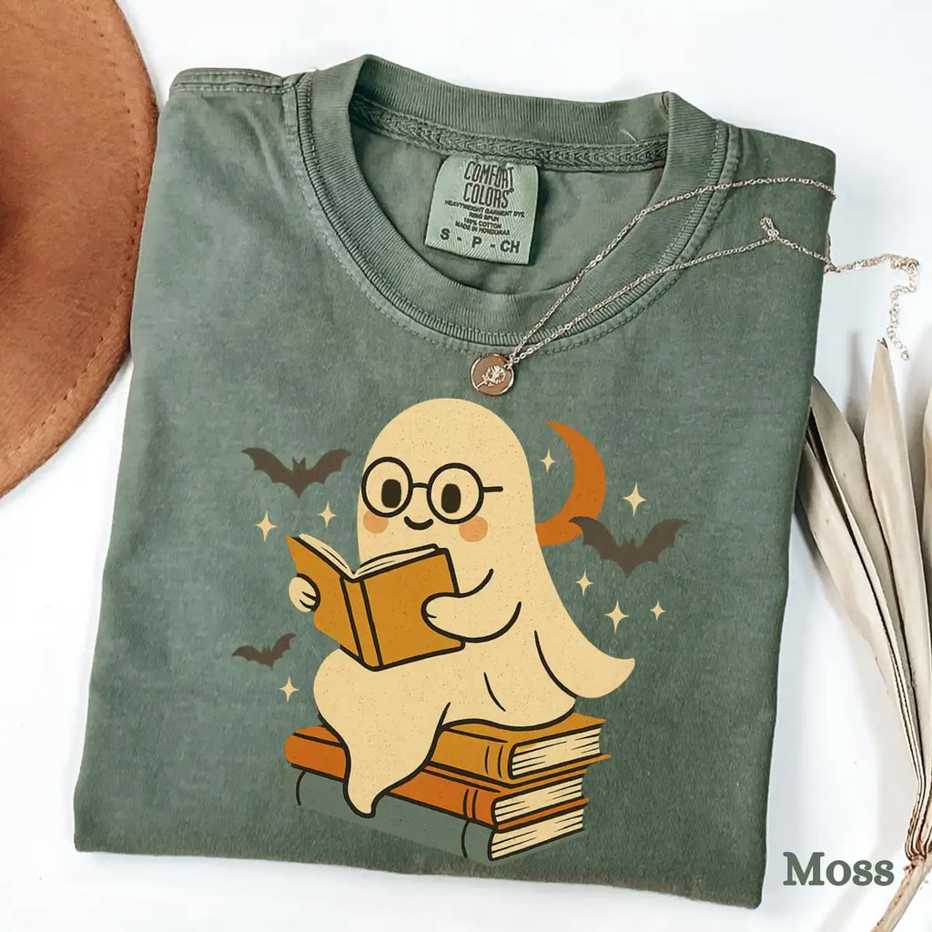 Moss Comfort Colors T-shirt mockup showing Retro Ghost Reading Books Halloween design