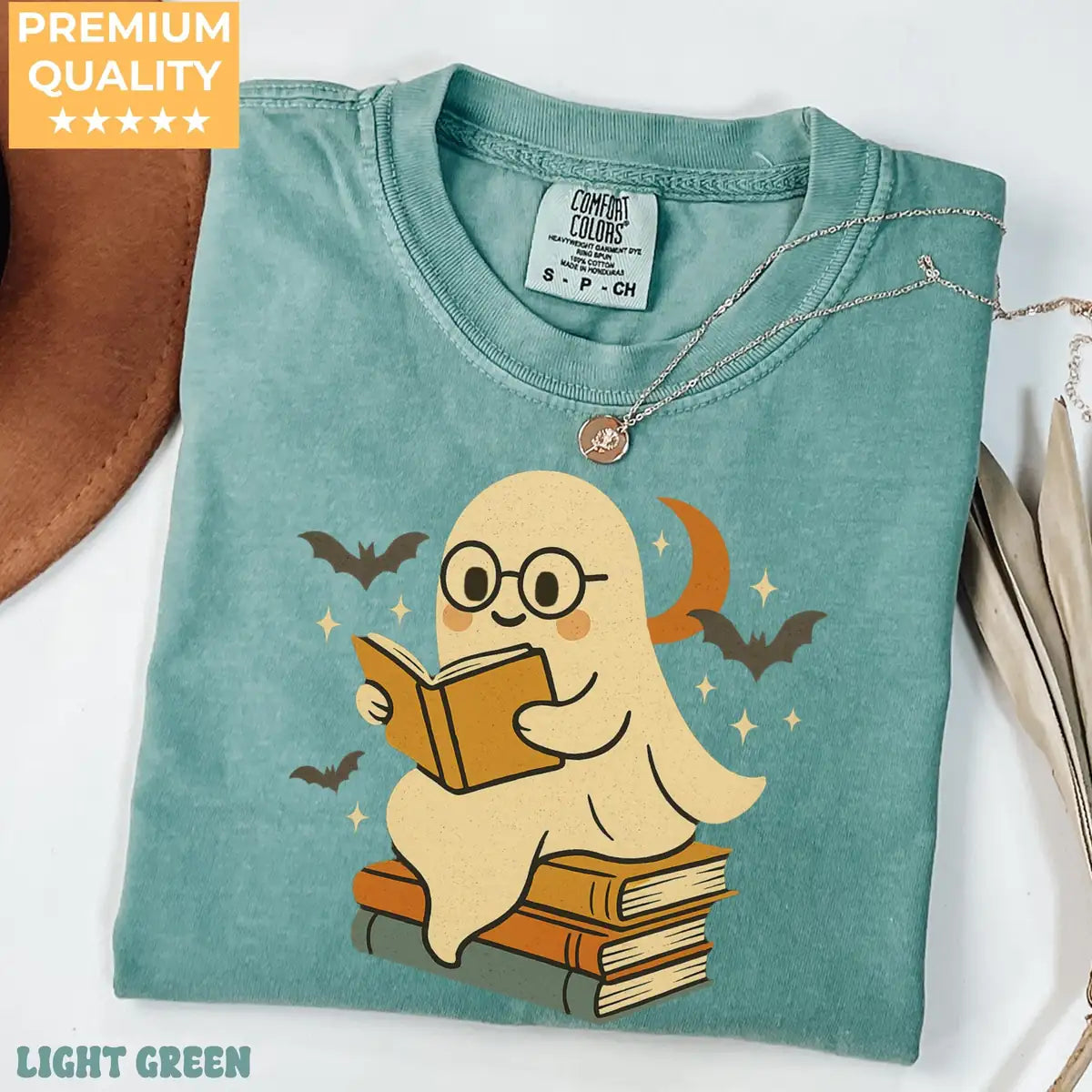 Espresso Comfort Colors T-shirt mockup showing Retro Ghost Reading Books Halloween design