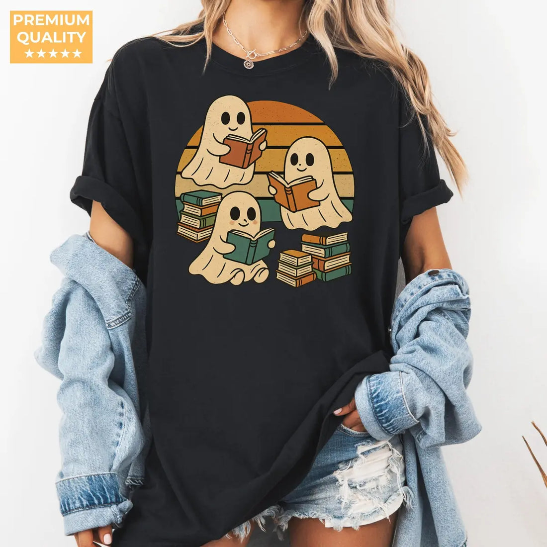 Black Comfort Colors T-shirt mockup showing Retro Ghost Reading Books Halloween design