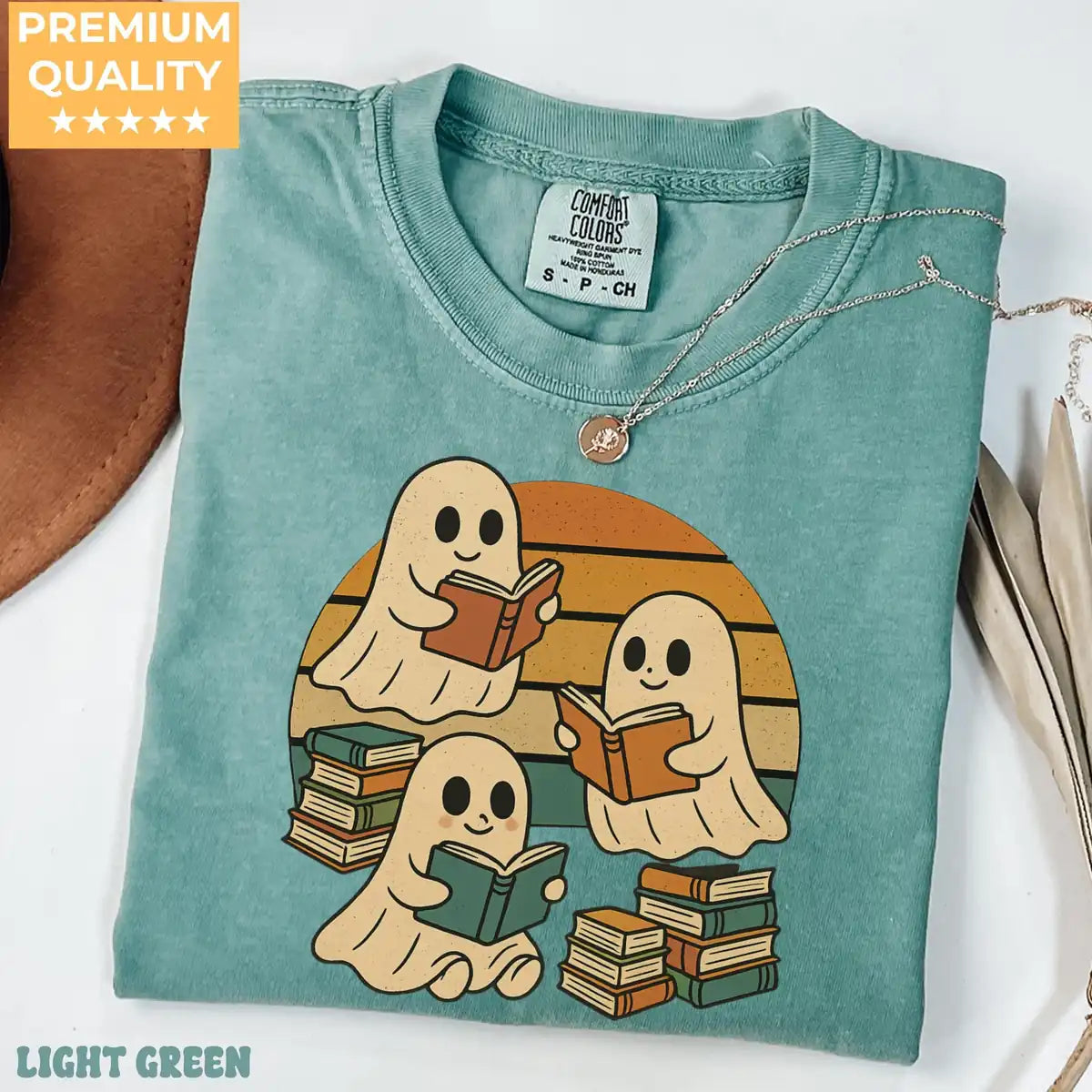Espresso Comfort Colors T-shirt mockup showing Retro Ghost Reading Books Halloween design