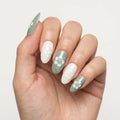 sage green hand painted almond long press on nails white hibiscus flat lay 02