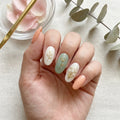 sage green hand painted almond medium press on nails floral mockup 01