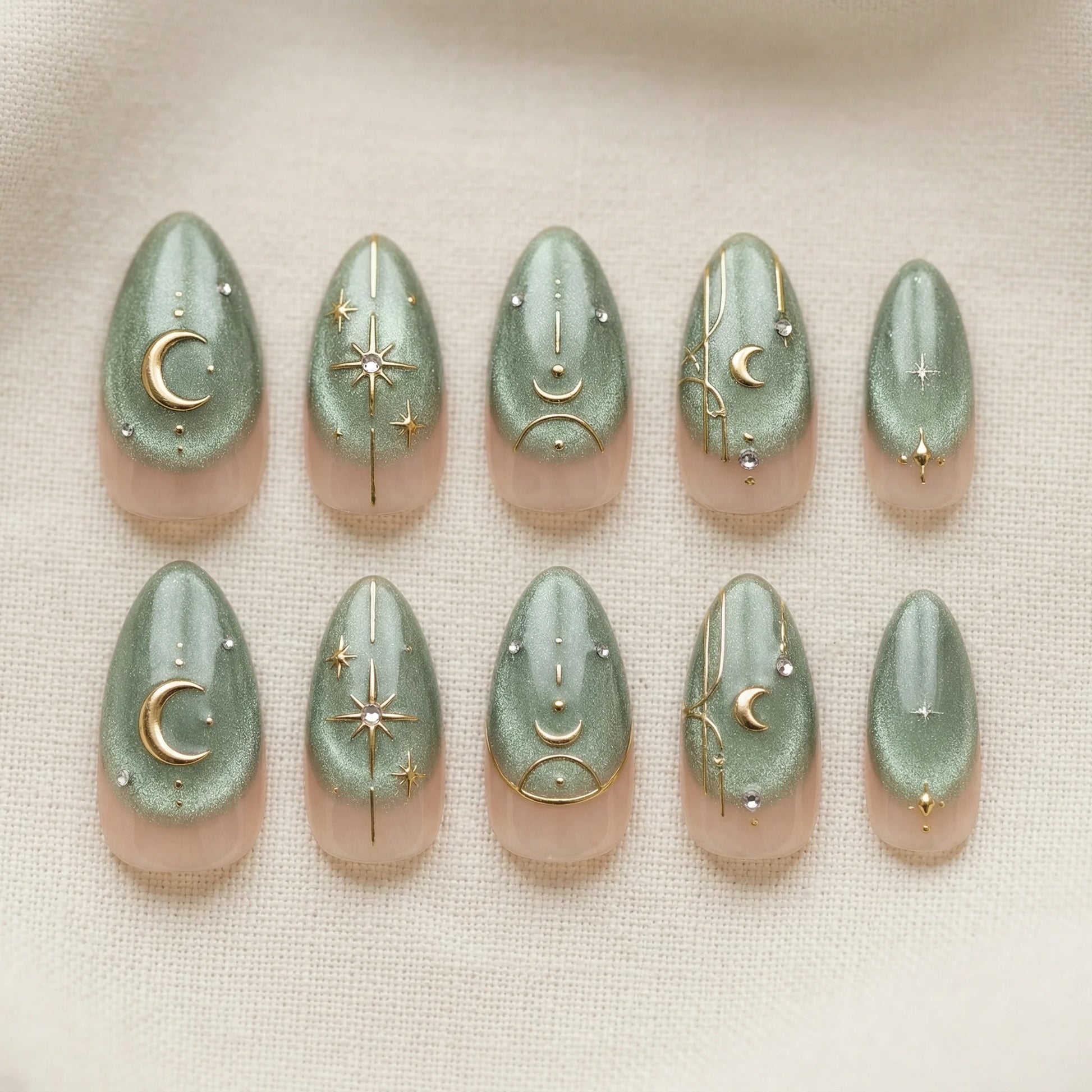 sage green hand painted almond medium press on nails flat lay 01