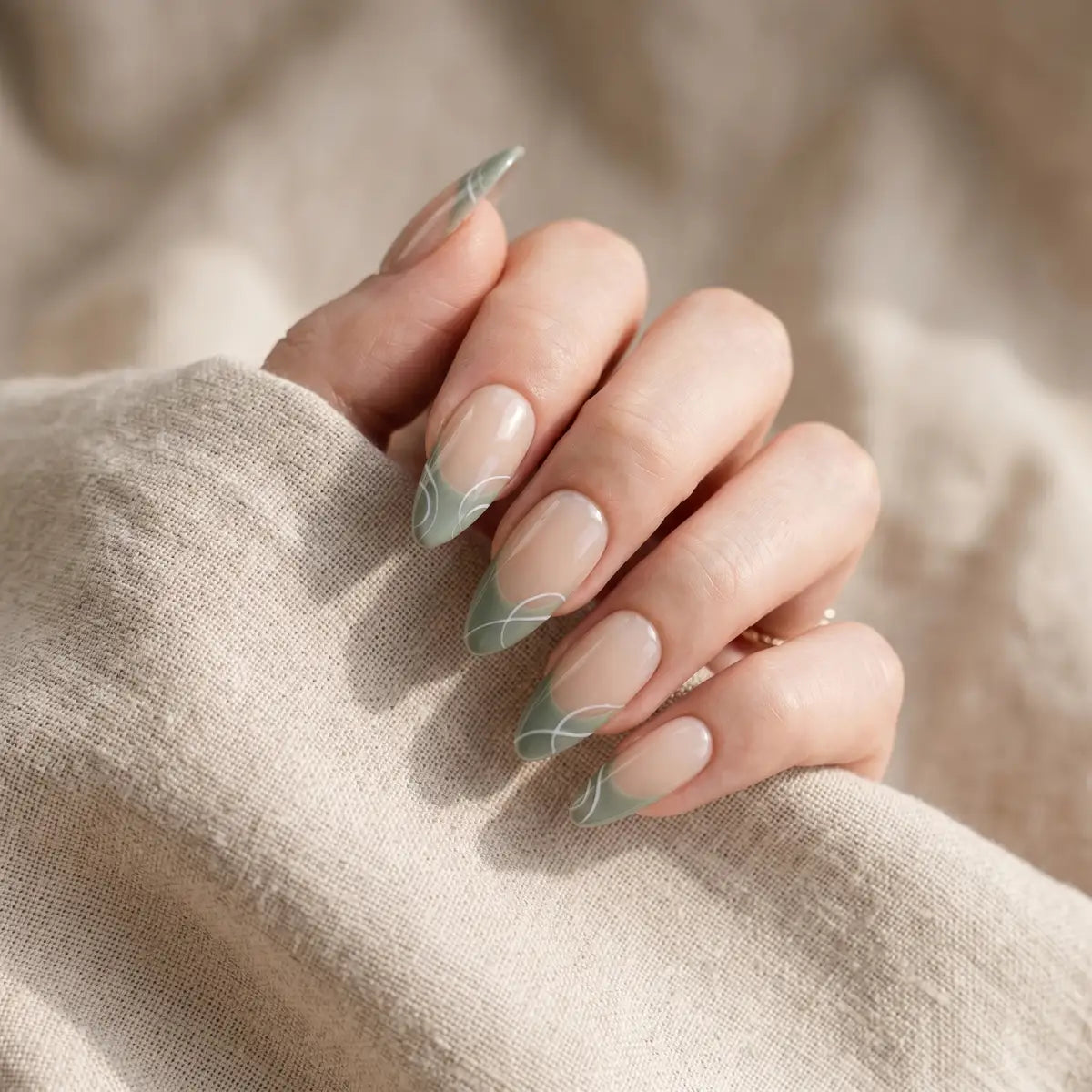 sage green hand painted almond press on nails abstract swirl detail 03