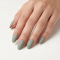 sage green hand painted almond press on nails white dot cross lifestyle 02