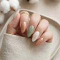 sage green terracotta almond medium press on nails gold lines flat lay 01